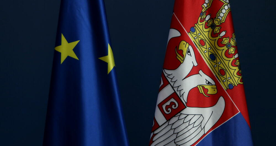 EU and Serbia flags, Shutterstock